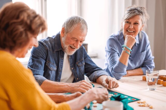 Three older people with each other