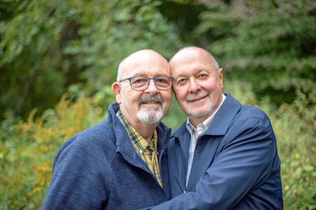 Two older people together outdoors